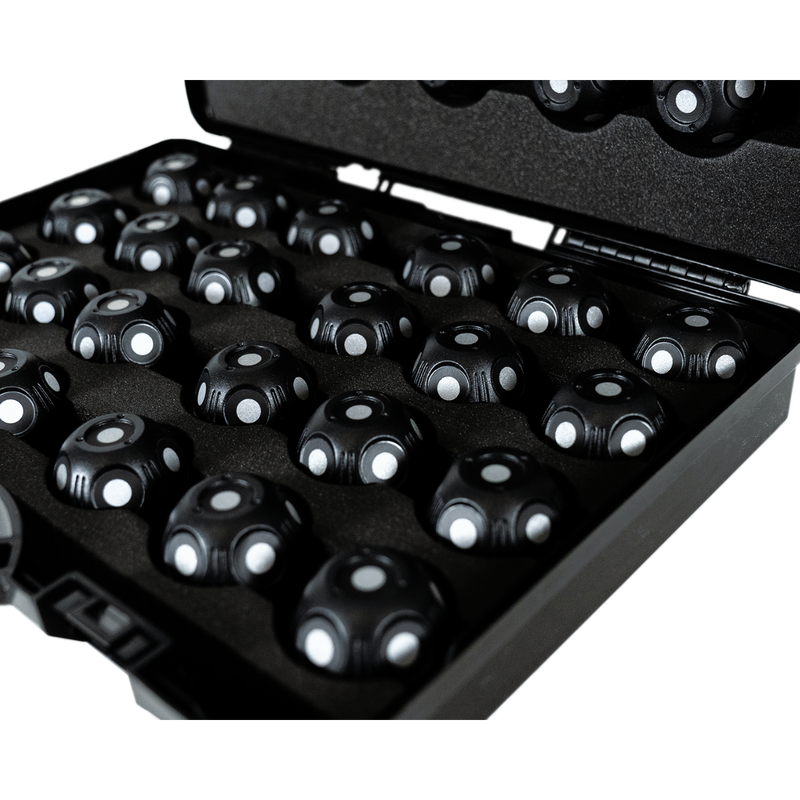Set of dome-shaped spheres covered in multiple circular, white retro-reflective tracking dots in a black carrying case 