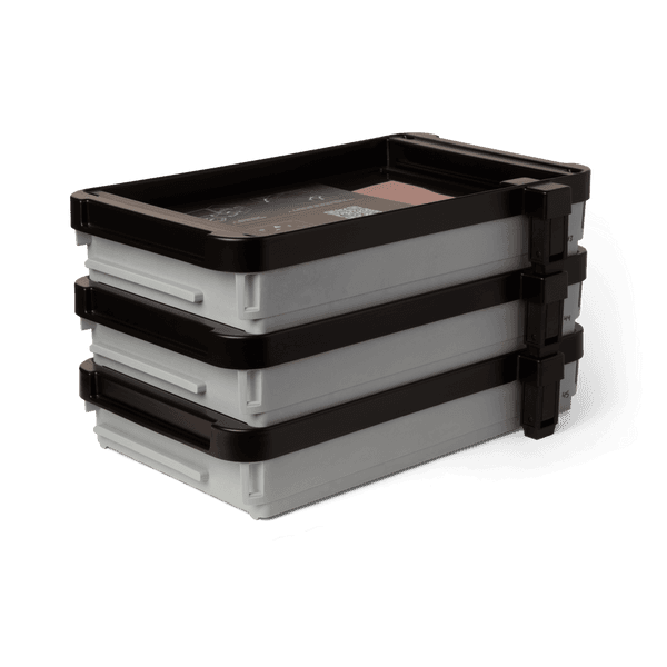 Stackable resin tanks with black lids for Form 4L 3D Printer on a transparent background