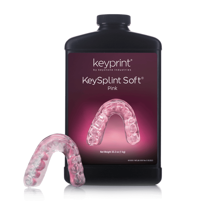 Image of KeySplint Soft Pink Resin with a 3D printed mouthguard on the side