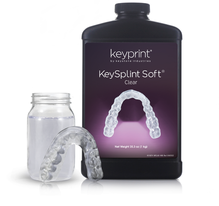 Image of KeySplint Soft Clear resin bottle with a 3D printed mouthguard on the side