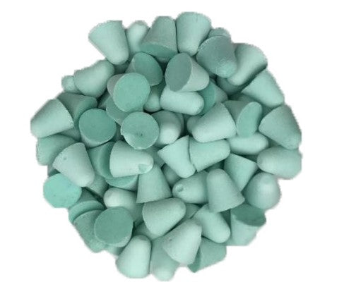 Image shows a pile of porcelain ceramic media for surface finishing from PostProcess