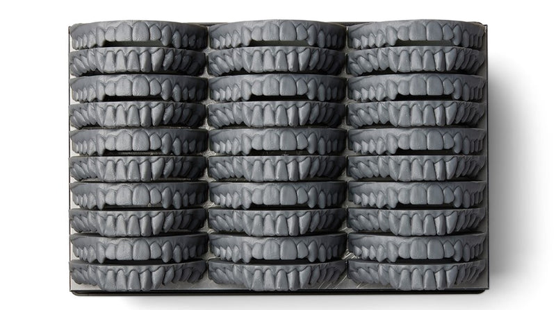 Formlabs Grey V5 Resin for Formlabs Form 4 SLA 3D printer | Image of Form 4 build platform with 3D printed dental models