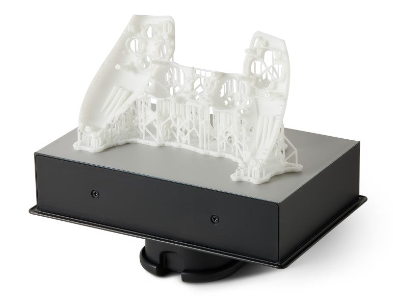 Formlabs White V.5 Resin for Form 4 SLA 3D Printer | Image of a 3D printed part on a Form 4 Build Platform