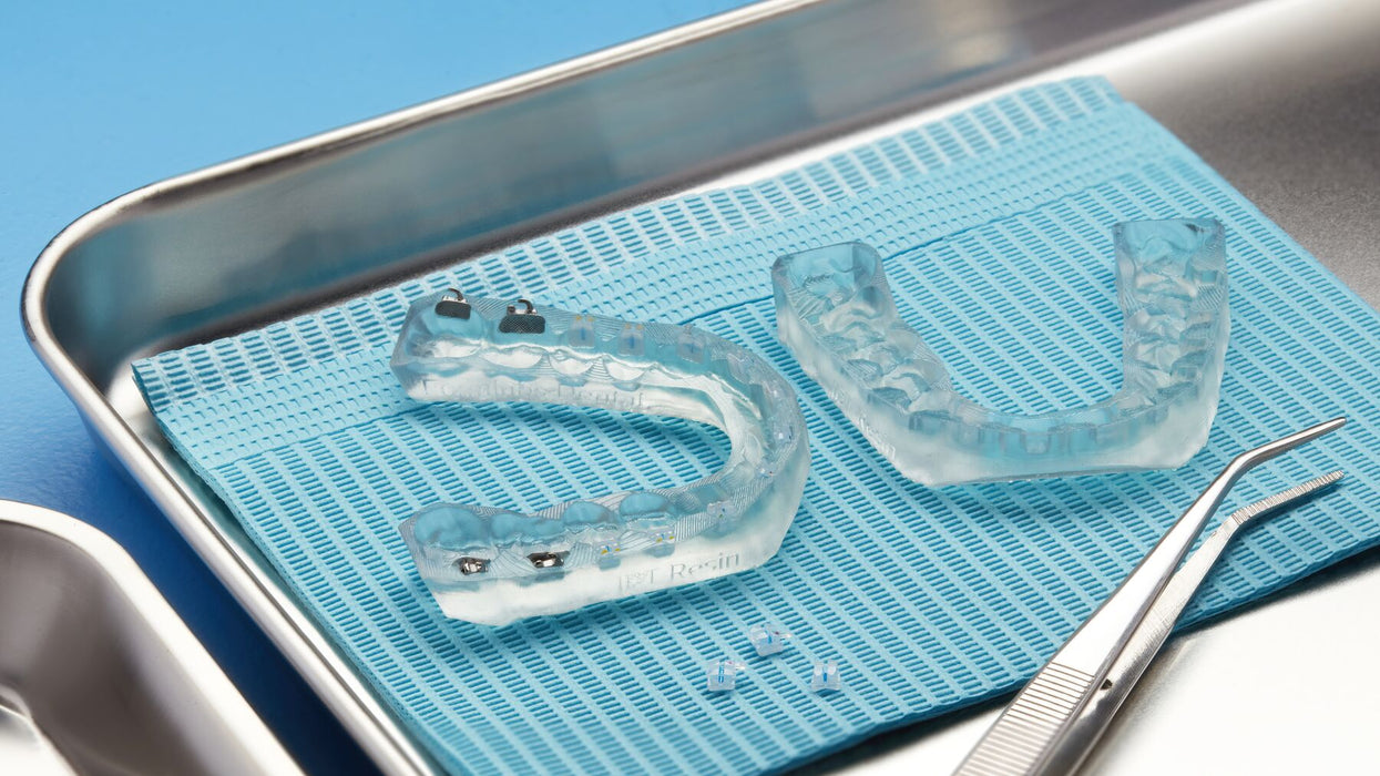 Image shows bonding dental tray 3D printed with Formlabs IBT Flex resin 