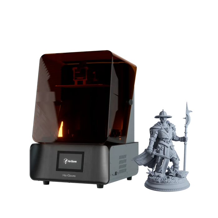 Image shows  HeyGears UltraCraft Reflex RS 3D Printer with a 3D printed figurine by its side