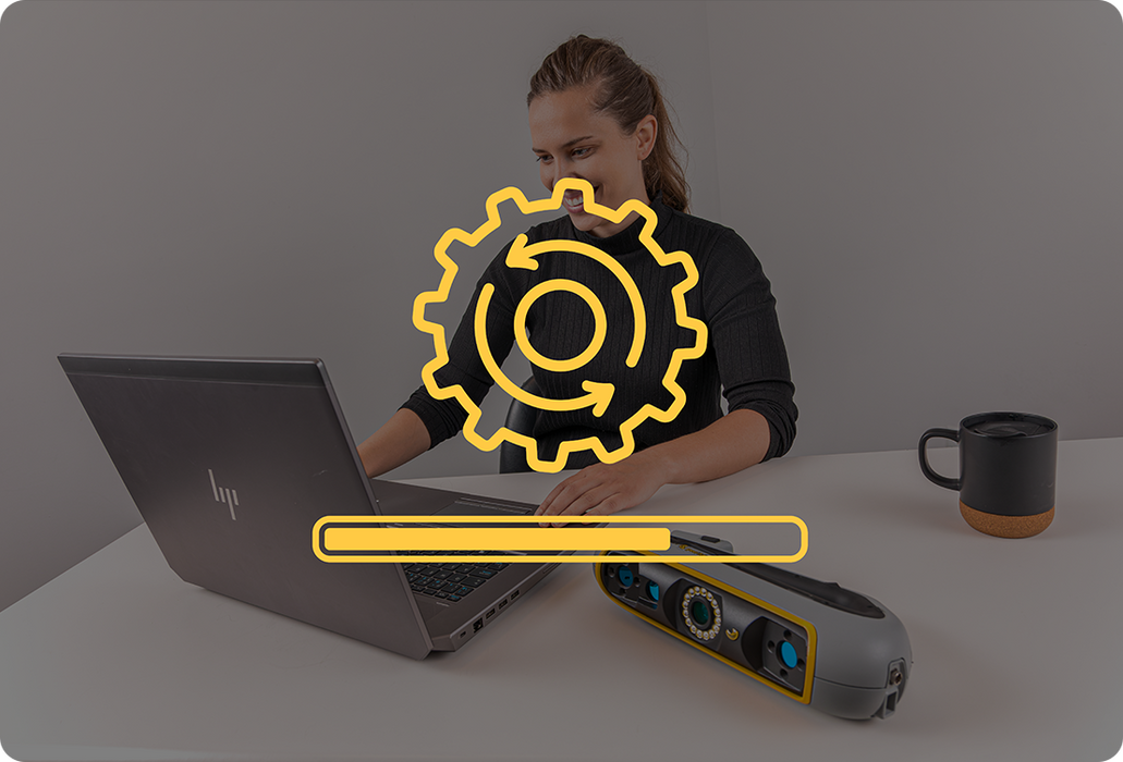 Image of a lady with an HP latop and 
Creaform Peel 3D scanner