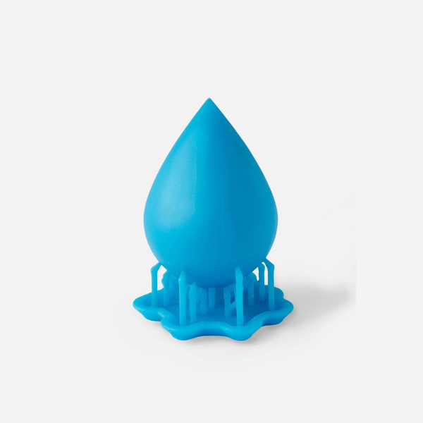 Image shows 3D printed part with support structure  produced with Formabs Cyan Color Pigment