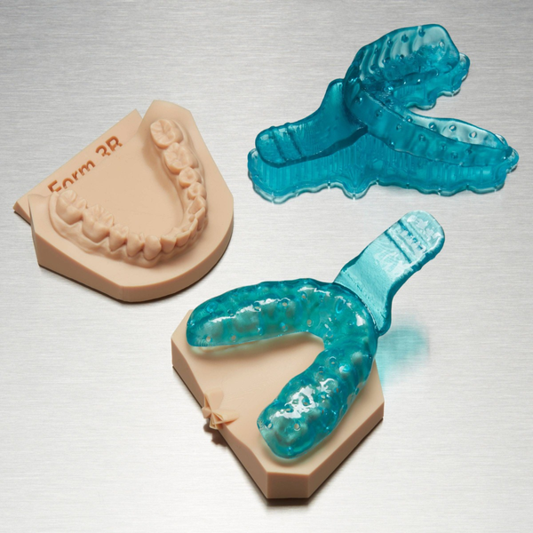 Image shows Formlabs dental custom trays 3D printed with Formlabs Custom Tray resinCustom Tray Resin, 1L - Proto3000 Online Store 