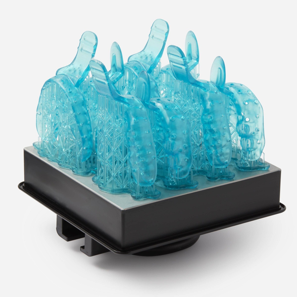 Image shows Formlabs Build Platform with dental custom trays 3D printed with Formlabs Custom Tray resinCustom Tray Resin, 1L - Proto3000 Online Store 